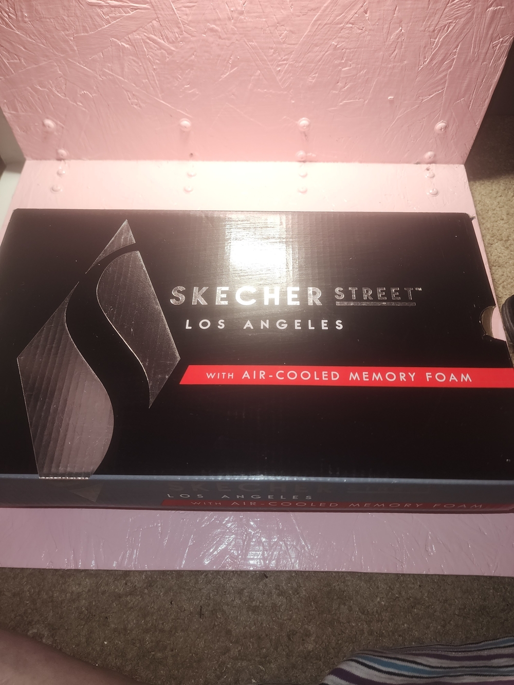 Skechers All-White Lace-Up Sneaker Pair